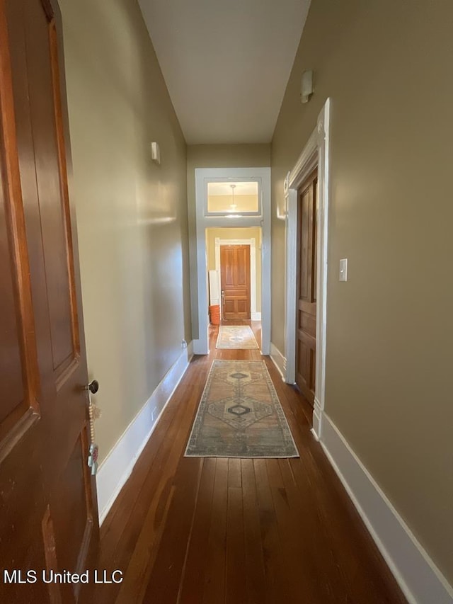 1116 Main St, Natchez, MS 39120 - hallway with baseboards and wood-type flooring