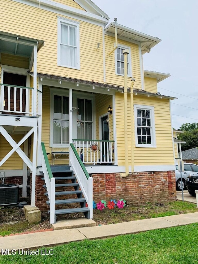 1116 Main St, Natchez, MS 39120 - exterior space with central AC unit and a porch
