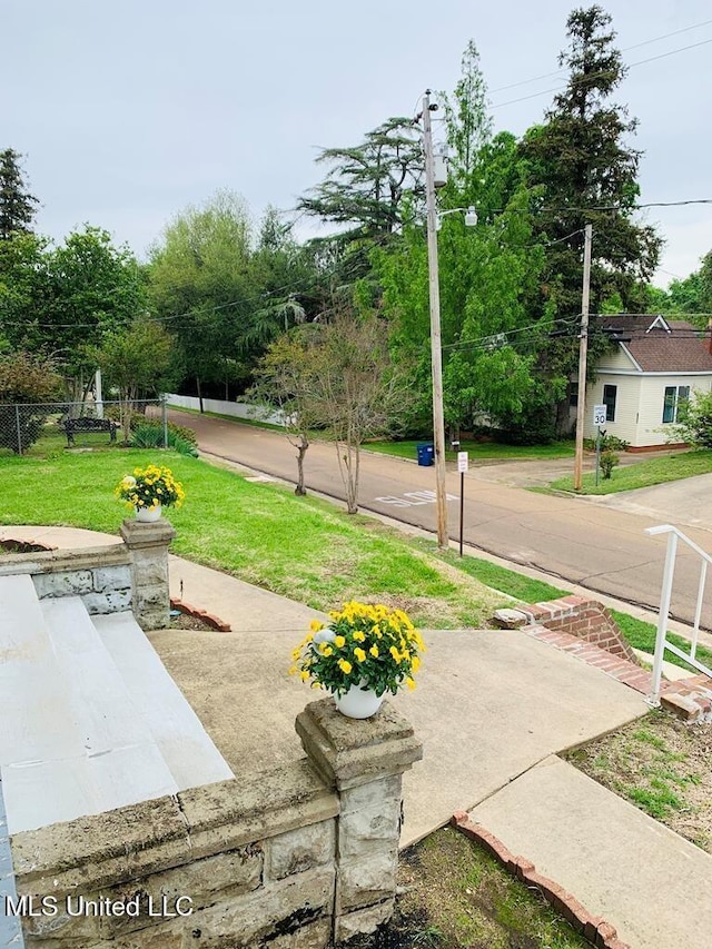 1116 Main St, Natchez, MS 39120 - view of community featuring a yard and fence