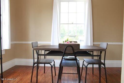 1116 Main St, Natchez, MS 39120 - dining space featuring wood finished floors and baseboards