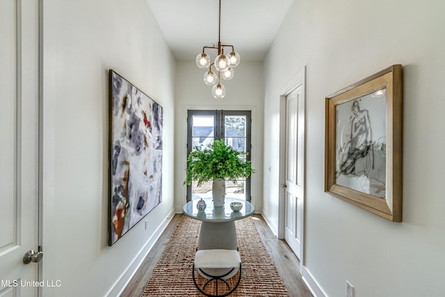 doorway to outside featuring hardwood / wood-style flooring