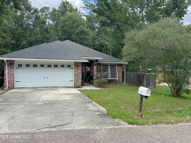 9929 Kahana St, Diamondhead, MS 39525 - ranch-style home with driveway, brick siding, a garage, and roof with shingles
