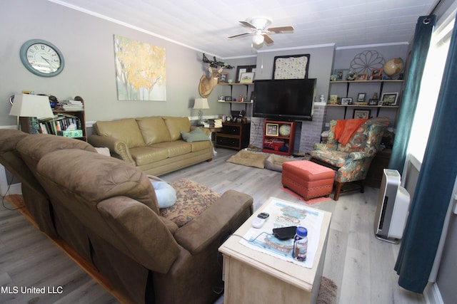 2174 County Road 53, Water Valley, MS 38965 - living room featuring ceiling fan, crown molding, and hardwood / wood-style floors