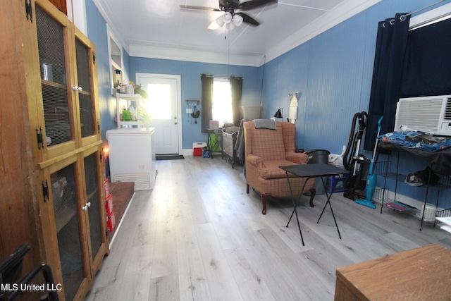 2174 County Road 53, Water Valley, MS 38965 - living area featuring ceiling fan, ornamental molding, cooling unit, and light wood-type flooring