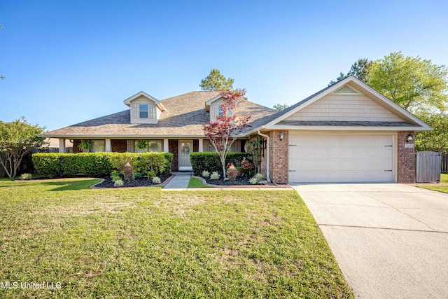 view of front of home featuring a garage, a front yard, brick siding, a shingled roof, and concrete driveway