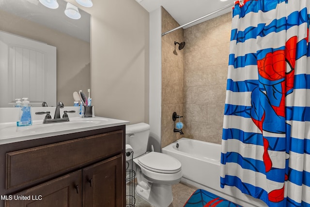 bathroom featuring shower / bath combo, vanity, and toilet