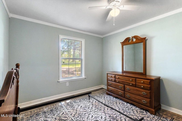 bedroom with ornamental molding and ceiling fan