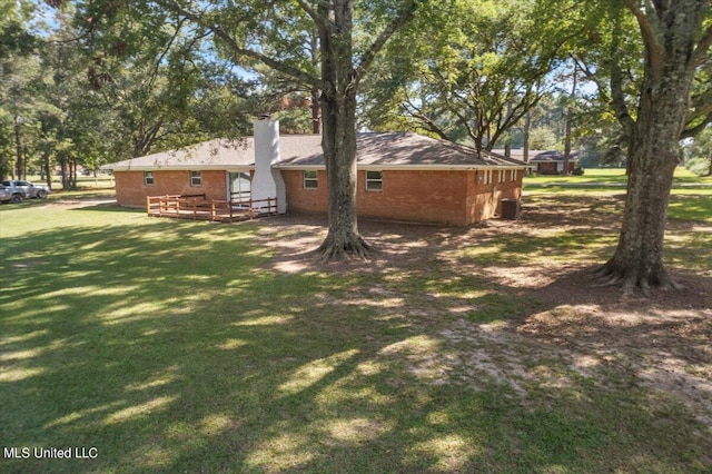 view of yard with a deck