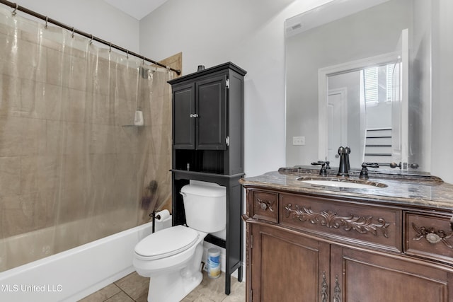 full bath with toilet, vanity, shower / bath combo with shower curtain, and tile patterned flooring