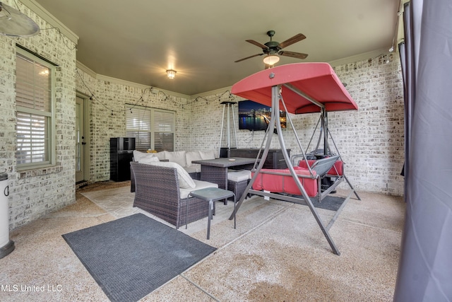 view of patio featuring an outdoor living space and ceiling fan