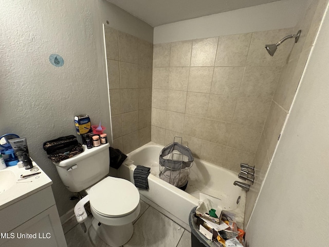 bathroom with vanity, toilet, and bathing tub / shower combination