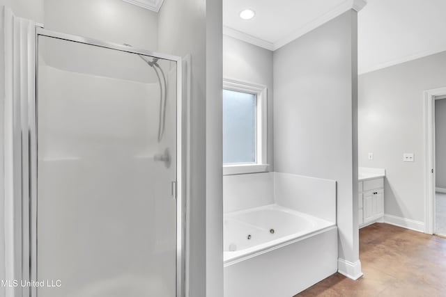 bathroom featuring independent shower and bath, vanity, and crown molding