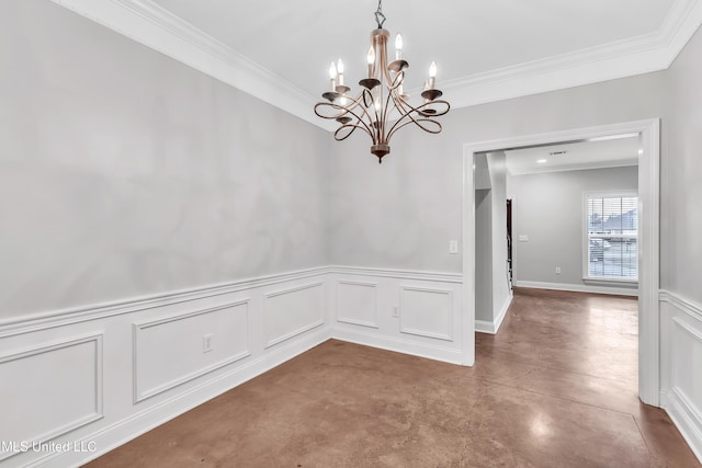 spare room featuring crown molding, a chandelier, and concrete floors