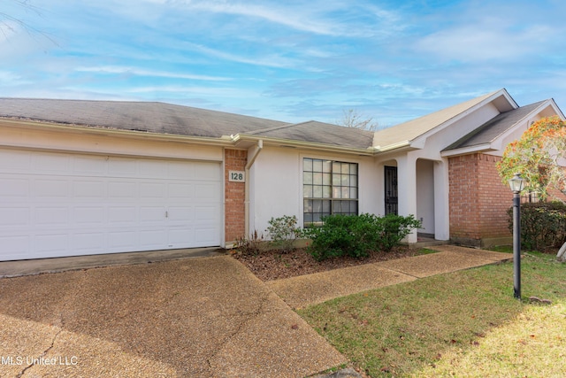 ranch-style home with a garage