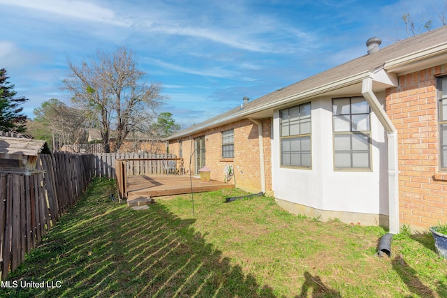 view of yard with a deck