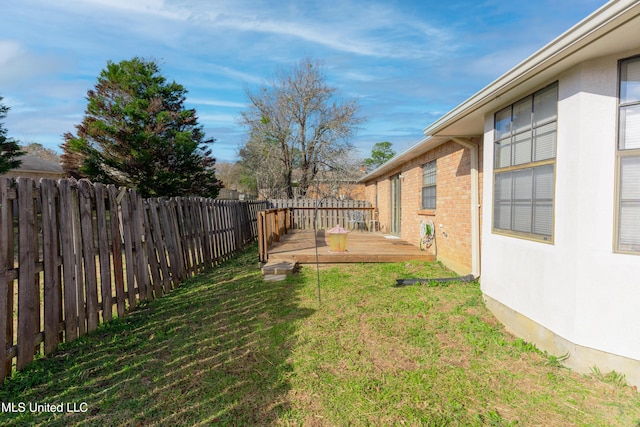 view of yard featuring a deck