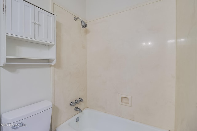 bathroom featuring toilet and tub / shower combination