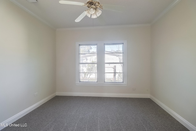 carpeted spare room with ceiling fan and crown molding