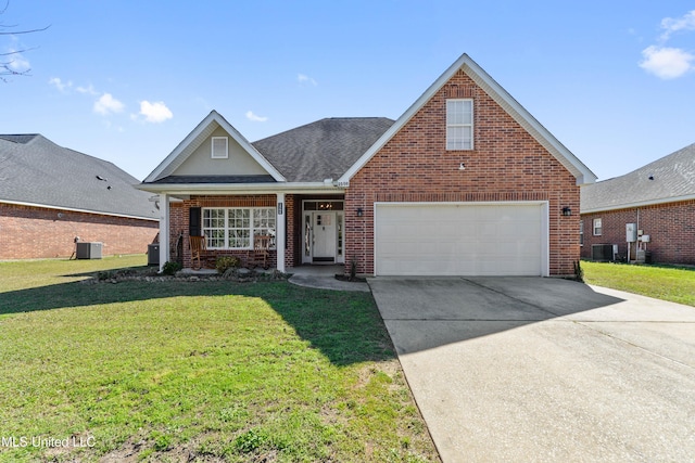 traditional-style home with central air condition unit, driveway, a front yard, and brick siding