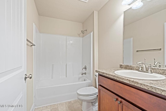 6743 Jessie Hoyt Dr, Olive Branch, MS 38654 - full bathroom with vanity, bathing tub / shower combination, toilet, and a textured ceiling