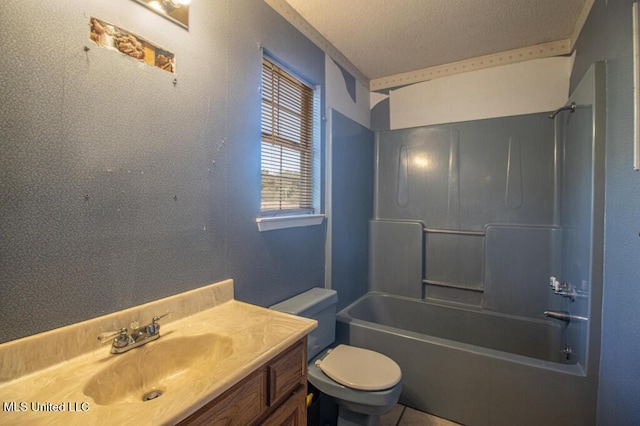 full bathroom with vanity, a textured ceiling, bathing tub / shower combination, and toilet