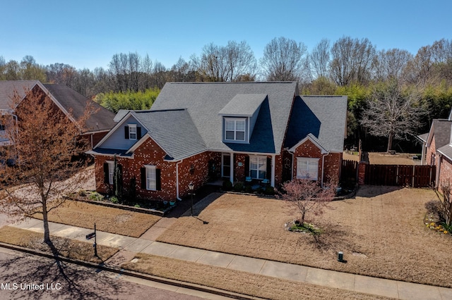7199 Terrace Stone Dr, Olive Branch, MS 38654 - view of front facade featuring fence and brick siding
