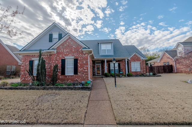 7199 Terrace Stone Dr, Olive Branch, MS 38654 - traditional-style home featuring brick siding and fence