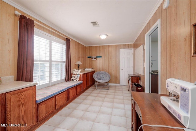 7199 Terrace Stone Dr, Olive Branch, MS 38654 - bathroom featuring crown molding, wood walls, and visible vents