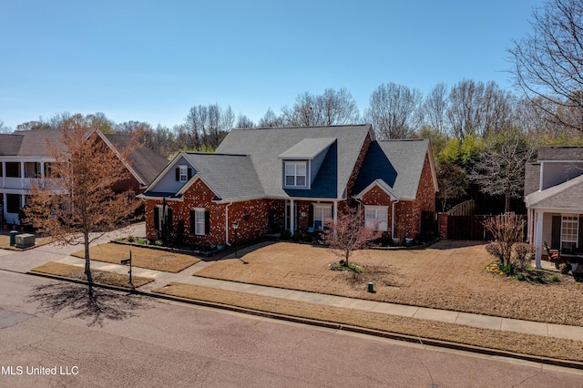 7199 Terrace Stone Dr, Olive Branch, MS 38654 - traditional-style house with brick siding and a gate