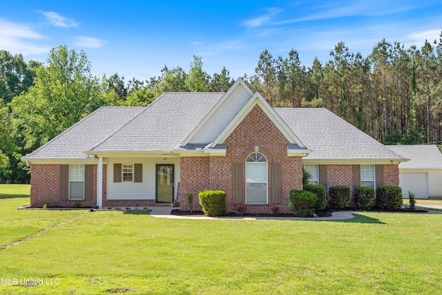 ranch-style house with brick siding, a front lawn, and a garage