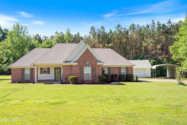 ranch-style home with a detached carport, brick siding, a front yard, and driveway