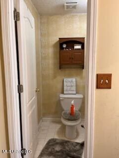 9091 Hunters Ridge Dr, Olive Branch, MS 38654 - bathroom with tile patterned flooring and toilet