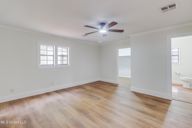 1018 27th St, Gulfport, MS 39501 - unfurnished room featuring ornamental molding, ceiling fan, light wood-style floors, and baseboards