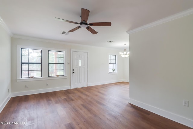1018 27th St, Gulfport, MS 39501 - foyer with a chandelier, ornamental molding, ceiling fan, wood finished floors, and baseboards