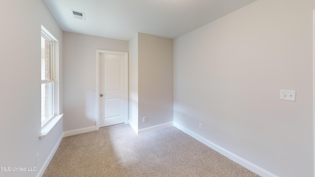 view of carpeted spare room