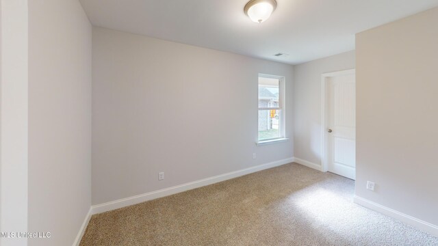 view of carpeted spare room