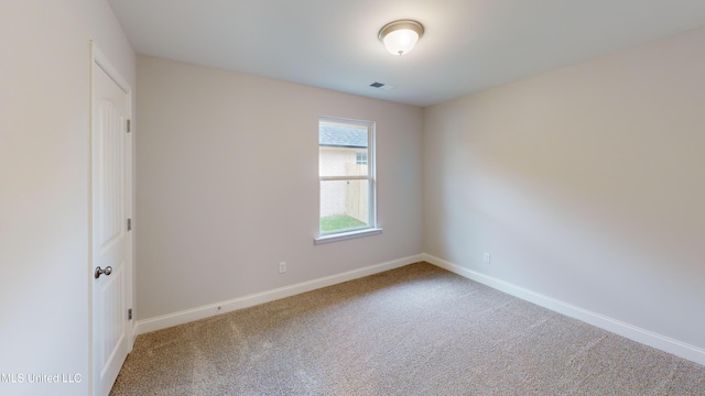 view of carpeted spare room