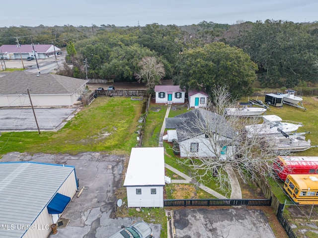 aerial view featuring a wooded view