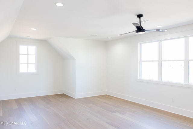 bonus room with ceiling fan, vaulted ceiling, and light hardwood / wood-style flooring