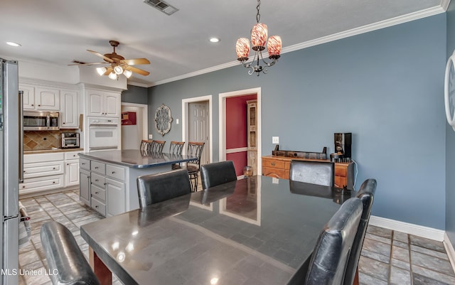 dining space featuring visible vents, crown molding, baseboards, ceiling fan with notable chandelier, and recessed lighting