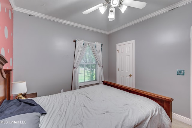 bedroom featuring crown molding, baseboards, and ceiling fan