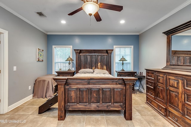 bedroom featuring multiple windows, ornamental molding, and visible vents