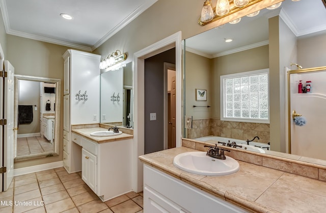 full bathroom featuring tile patterned floors, two vanities, a sink, and a stall shower