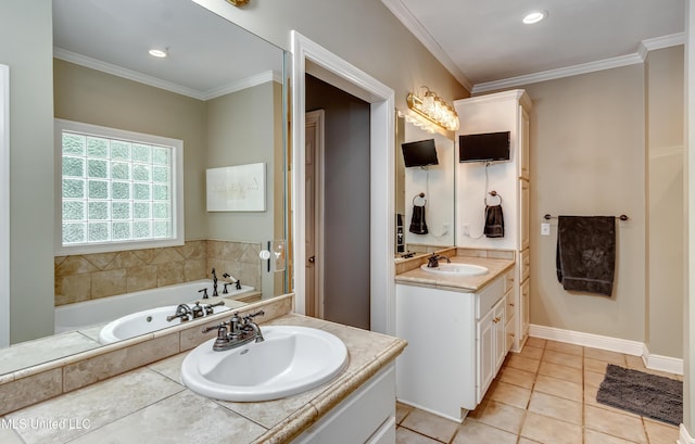 bathroom with crown molding, tile patterned flooring, vanity, recessed lighting, and a garden tub