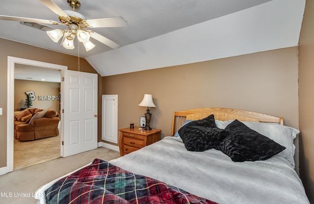 bedroom featuring ceiling fan, carpet, baseboards, lofted ceiling, and visible vents