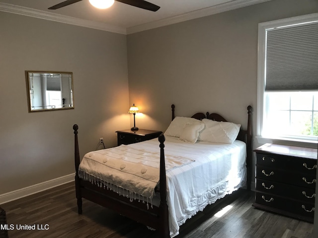 bedroom featuring dark wood-type flooring, ceiling fan, and ornamental molding