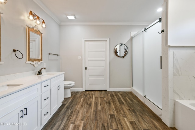 full bathroom with separate shower and tub, hardwood / wood-style floors, toilet, vanity, and crown molding