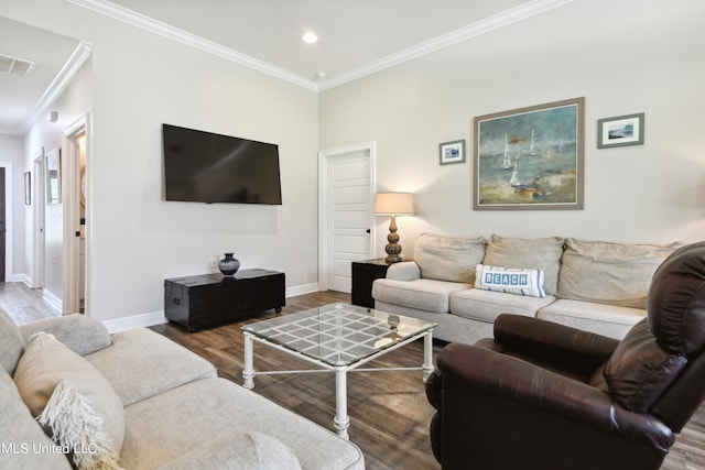 living room featuring crown molding and hardwood / wood-style floors