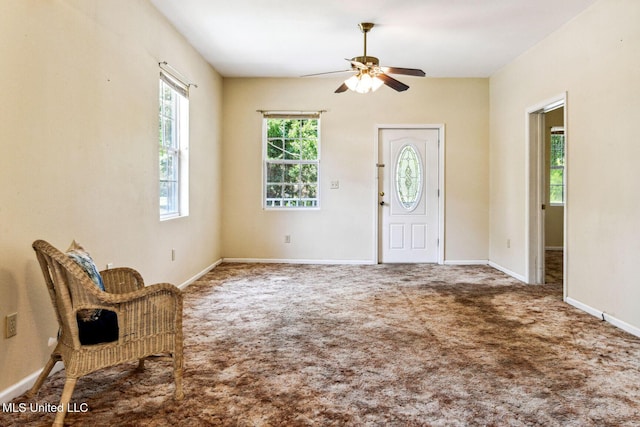 301 N Necaise Ave, Bay Saint Louis, MS 39520 - carpeted entrance foyer featuring ceiling fan and baseboards
