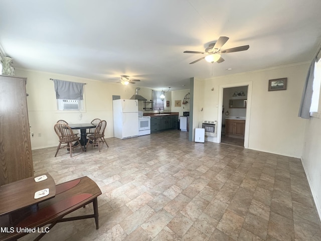 living room featuring heating unit, ceiling fan, sink, and cooling unit